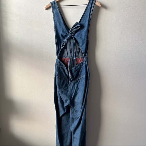 9. Free People Denim Jumpsuit - Picture 3 of 6